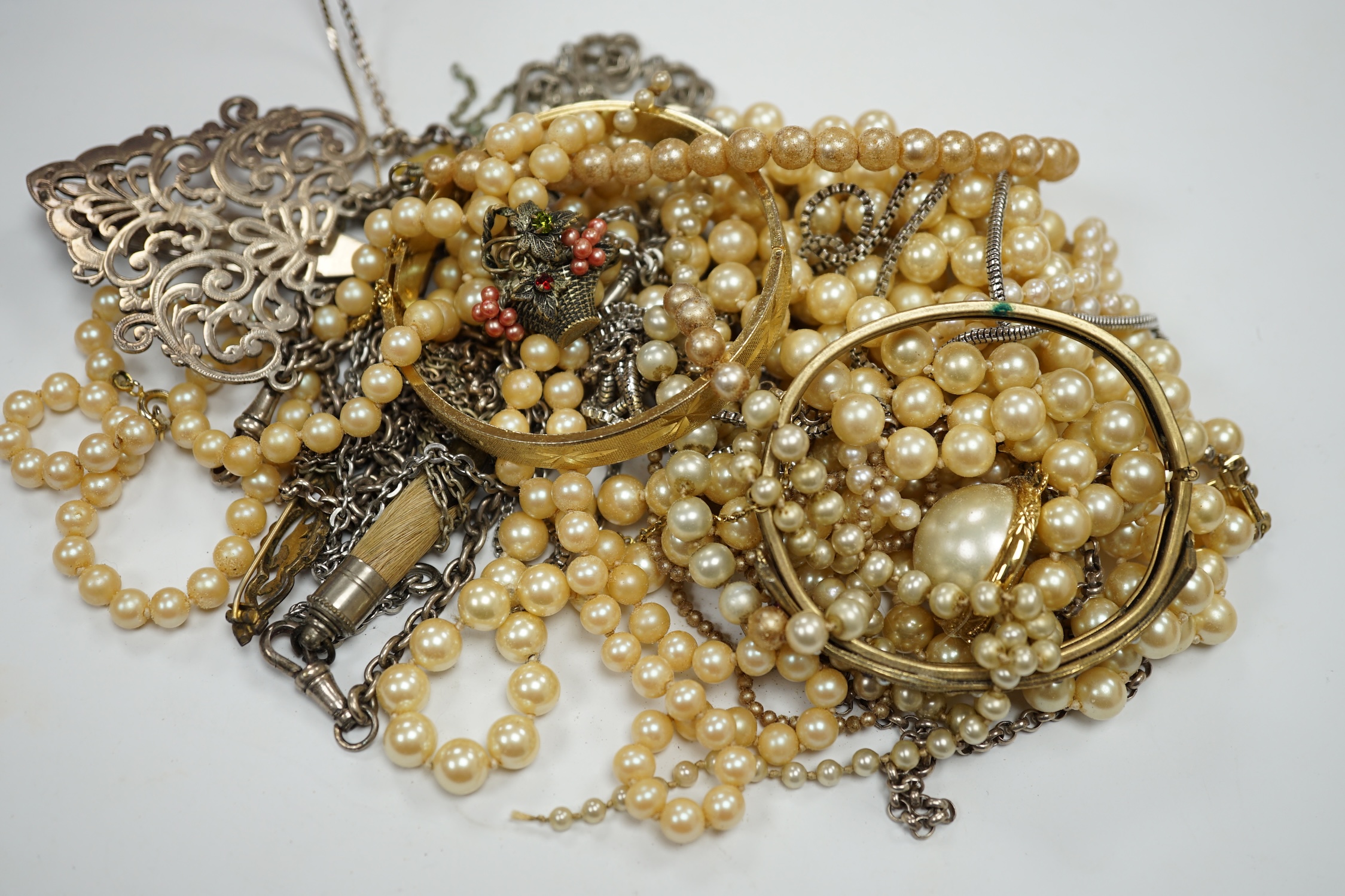 A quantity of assorted silver, white metal and costume jewellery, including bangles, fruit knife, etc. Condition - poor to fair